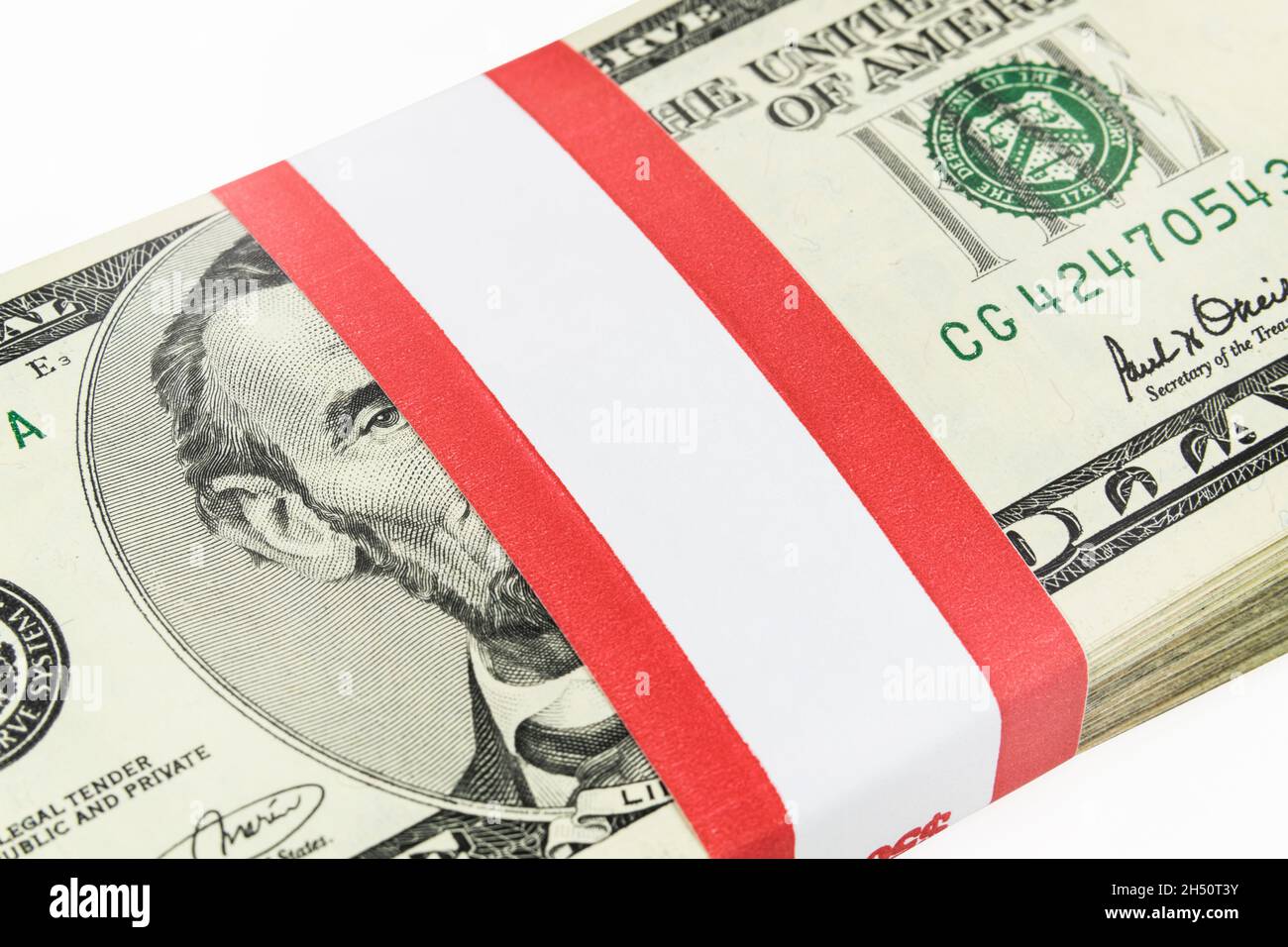 Five dollar money bundle with blank paper currency strap. Stock Photo