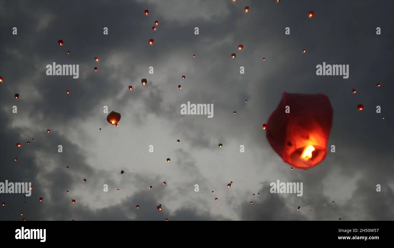 Many sky lanterns in the sky. Floating lanterns ceremony or Yeepeng