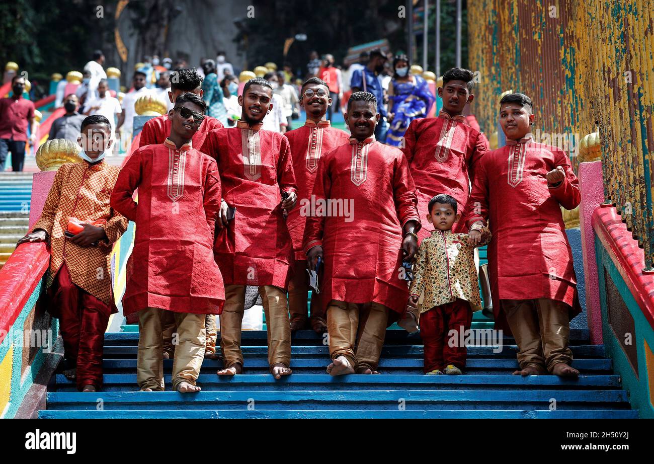 Hindu devotees seen walking on the coloured stairs after offering
