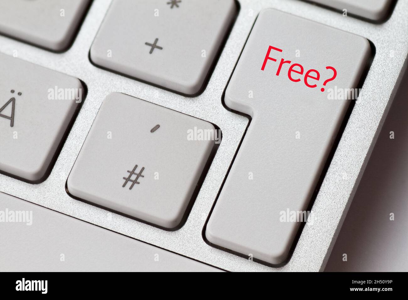 Free? as a term on an aluminum keyboard from a computer Stock Photo - Alamy