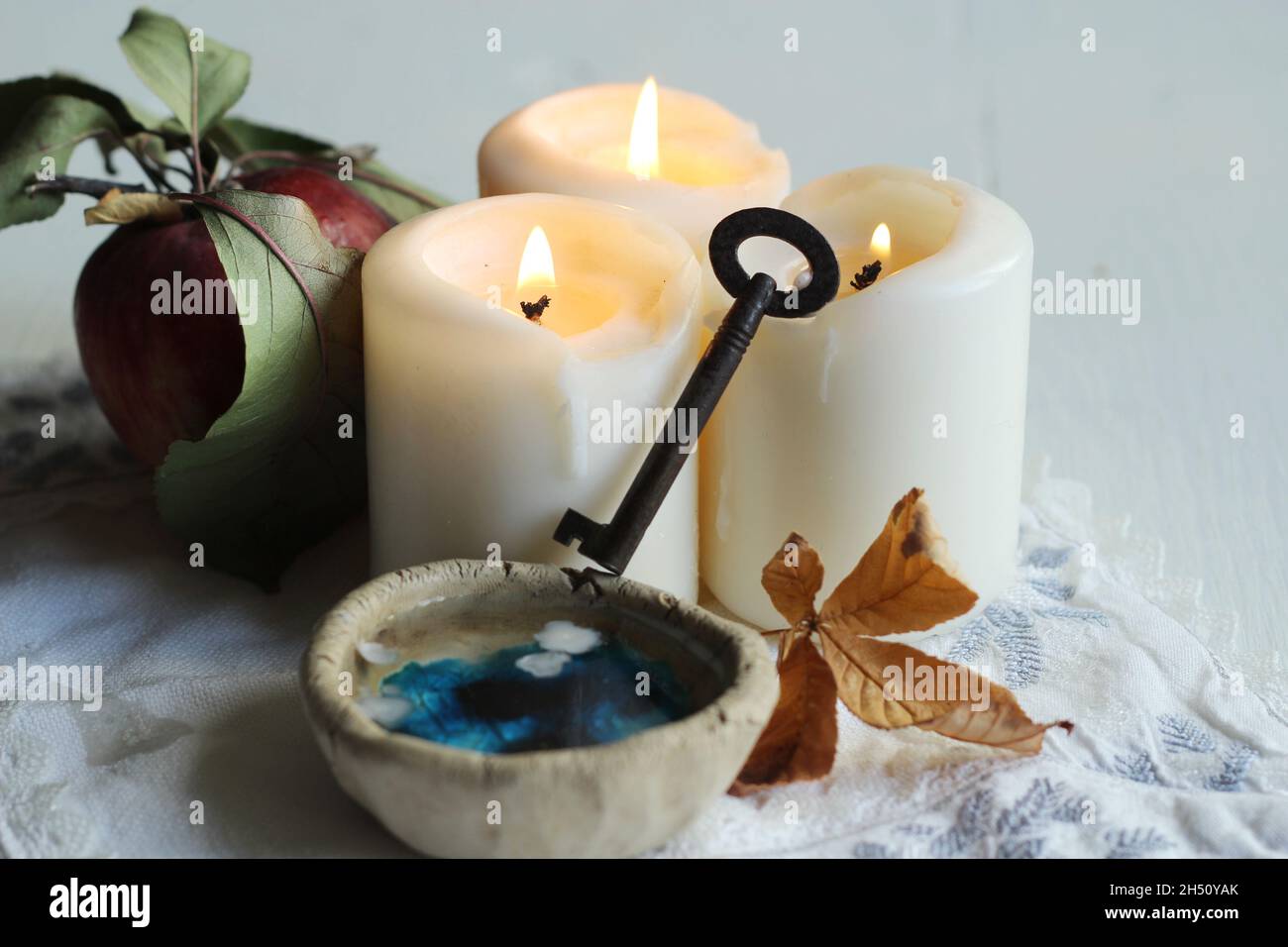 Traditional polish Divination with wax on St Andrew Day with wax , kay and water Stock Photo