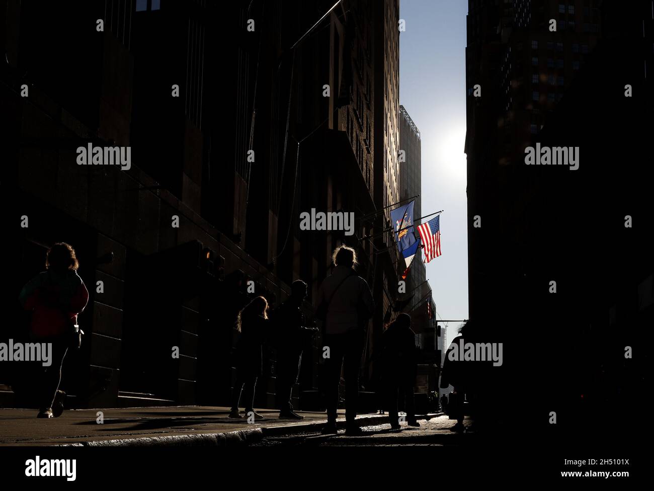 New York, USA. 05th Nov, 2021. Pedestrians walk on Wall Street before the opening bell at the NYSE in New York City on Friday, November 5, 2021. Photo by John Angelillo/UPI Credit: UPI/Alamy Live News Stock Photo