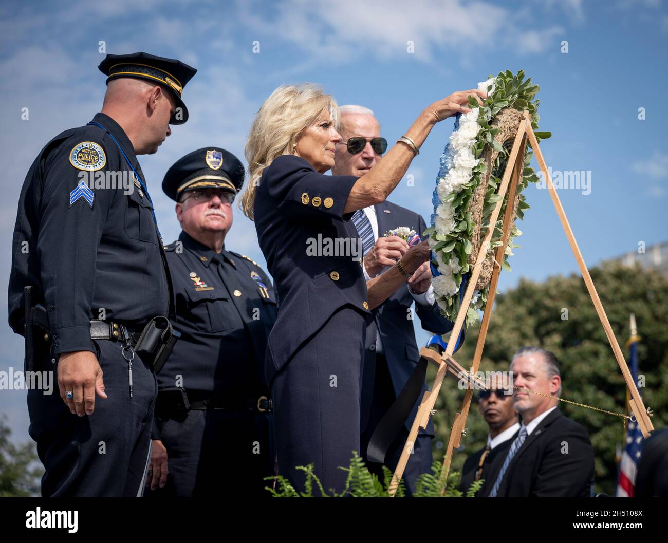 Washington, United States of America. 16 October, 2021. U.S President Joe Biden and First Lady Dr. Jill Biden place a wreath during a ceremony honoring fallen law enforcement officers at the 40th annual National Peace Officers Memorial Service at the U.S. Capitol October 16, 2021 in Washington, D.C. Credit: Benjamin Applebaum/Homeland Security/Alamy Live News Stock Photo