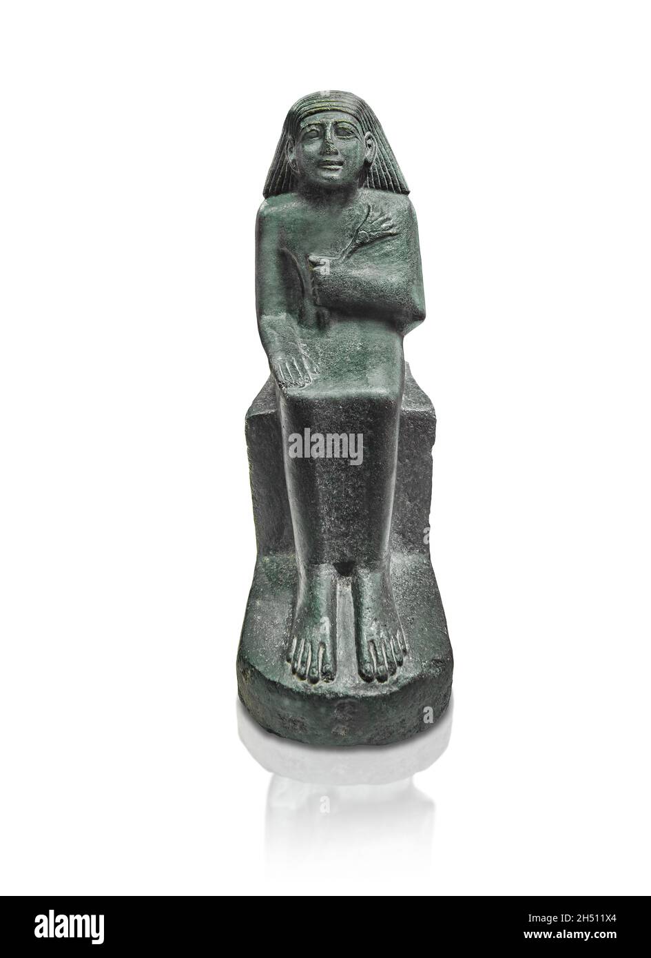Egyptian statue sculpture of a man holding a flower, circa 1479 BC, 18th dynasty, diorite. Louvre Museum N5404. Man (seated, coat, left arm bent over Stock Photo