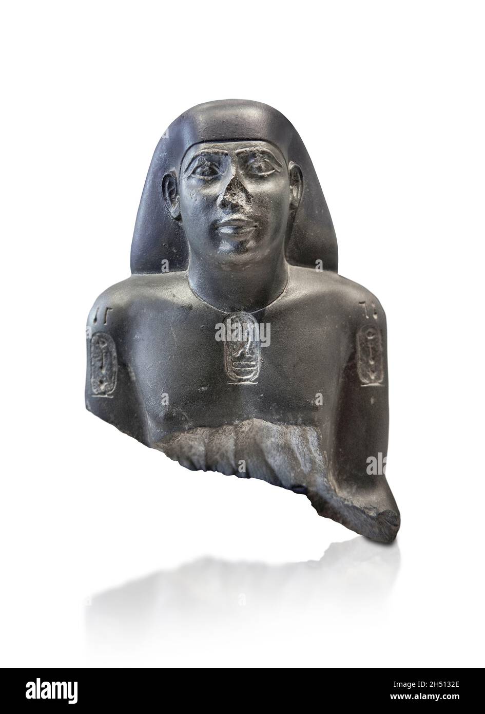 Egyptian statue fragment of a man, naophore , dedicated to Horus, 610-595, 26th dynasry, Letopolis, greywack. Louvre Museum E10709.  Reign of Nekao II Stock Photo