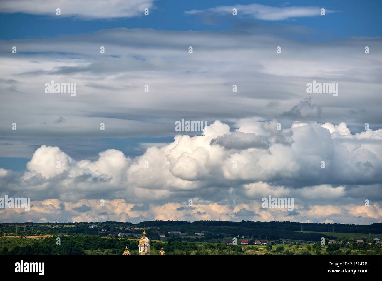 Landscape of dark clouds forming on stormy sky during thunderstorm over ...