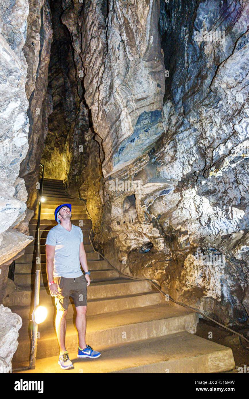 Cradle of humankind cave interior inside man male looking up hires stock photography and images
