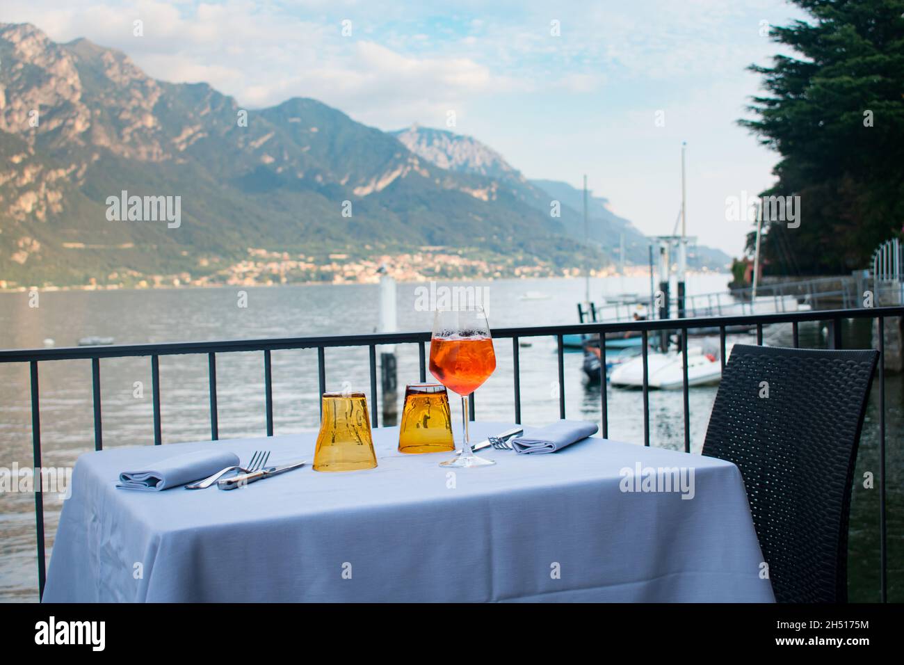 Two Aperol spritz cocktails at dinner restaurant in Lake Como Italy Stock Photo
