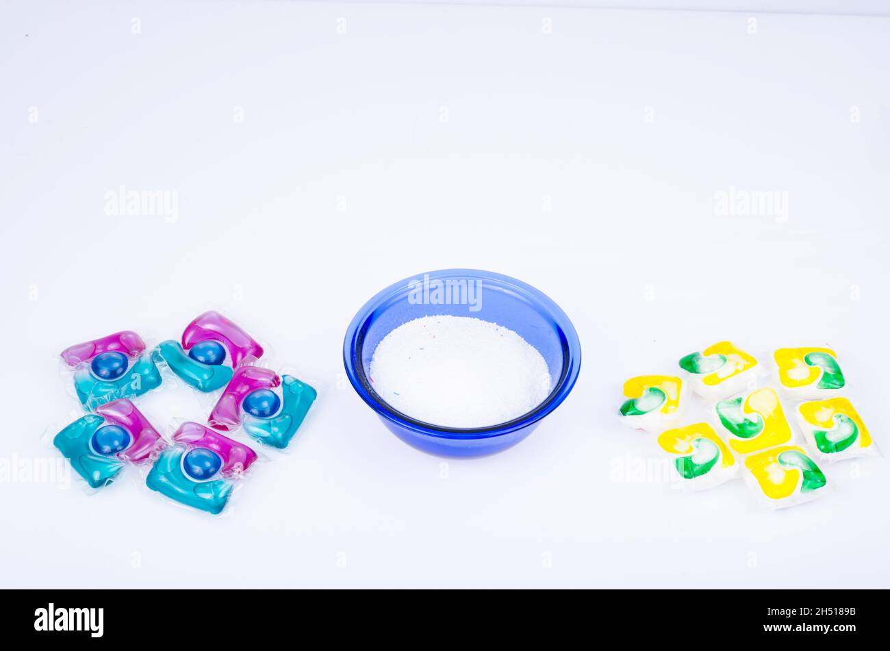 Various detergents for washing clothes, capsules and powder. Studio