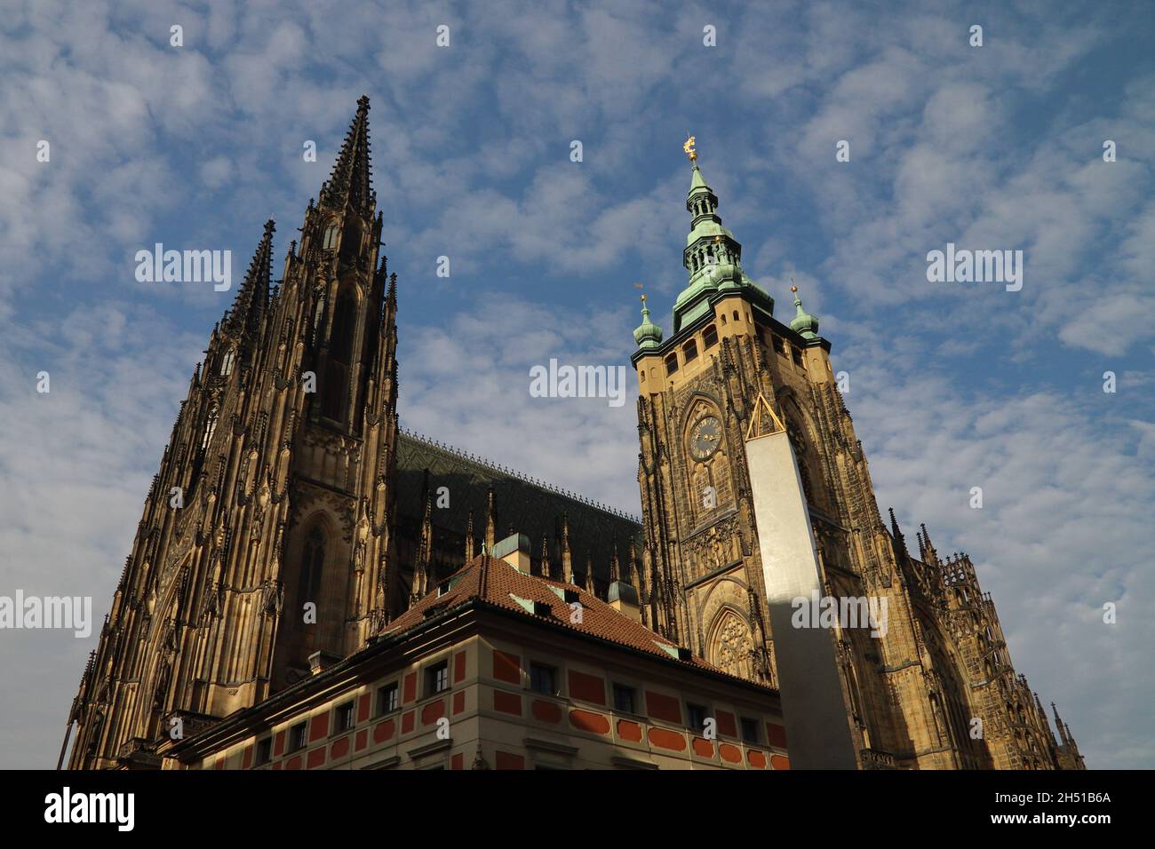 Old saint cathedral in Prague, blue cloudy sky Stock Photo