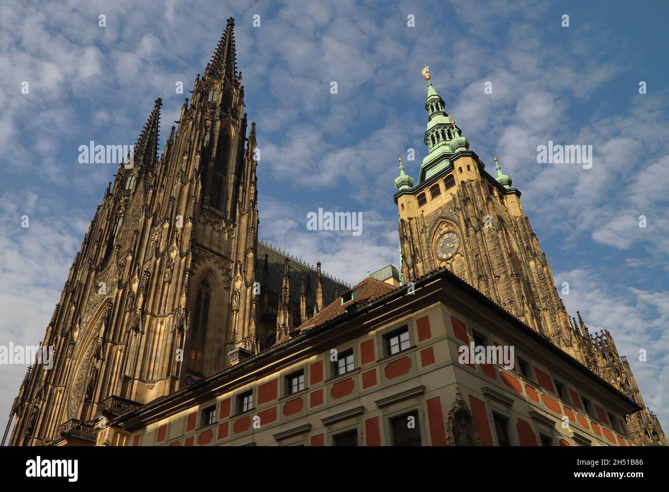 Old saint cathedral in Prague, blue cloudy sky Stock Photo