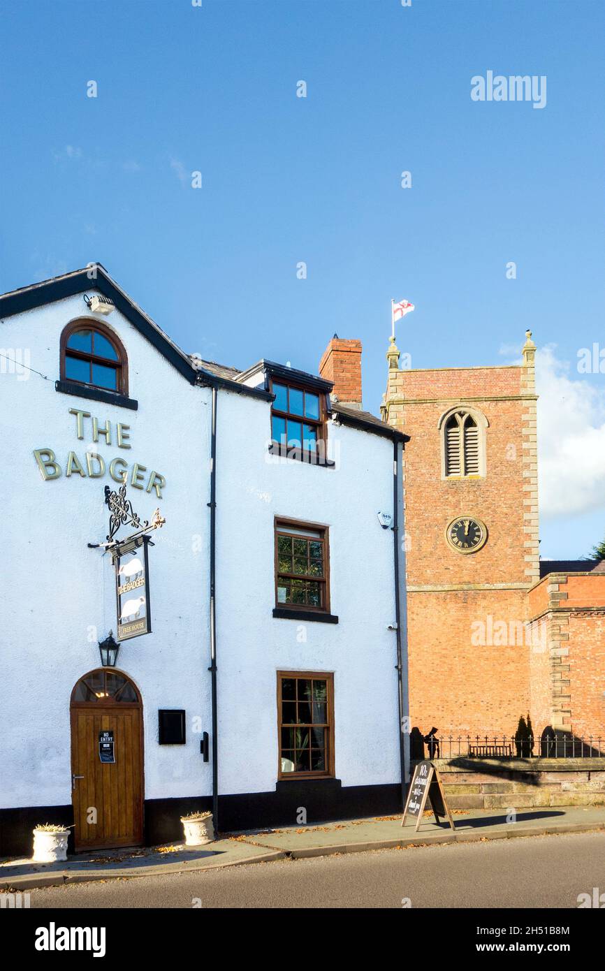 St Bartholomew's parish Church and the Badger public house, in the Cheshire village of Church Minshull Stock Photo
