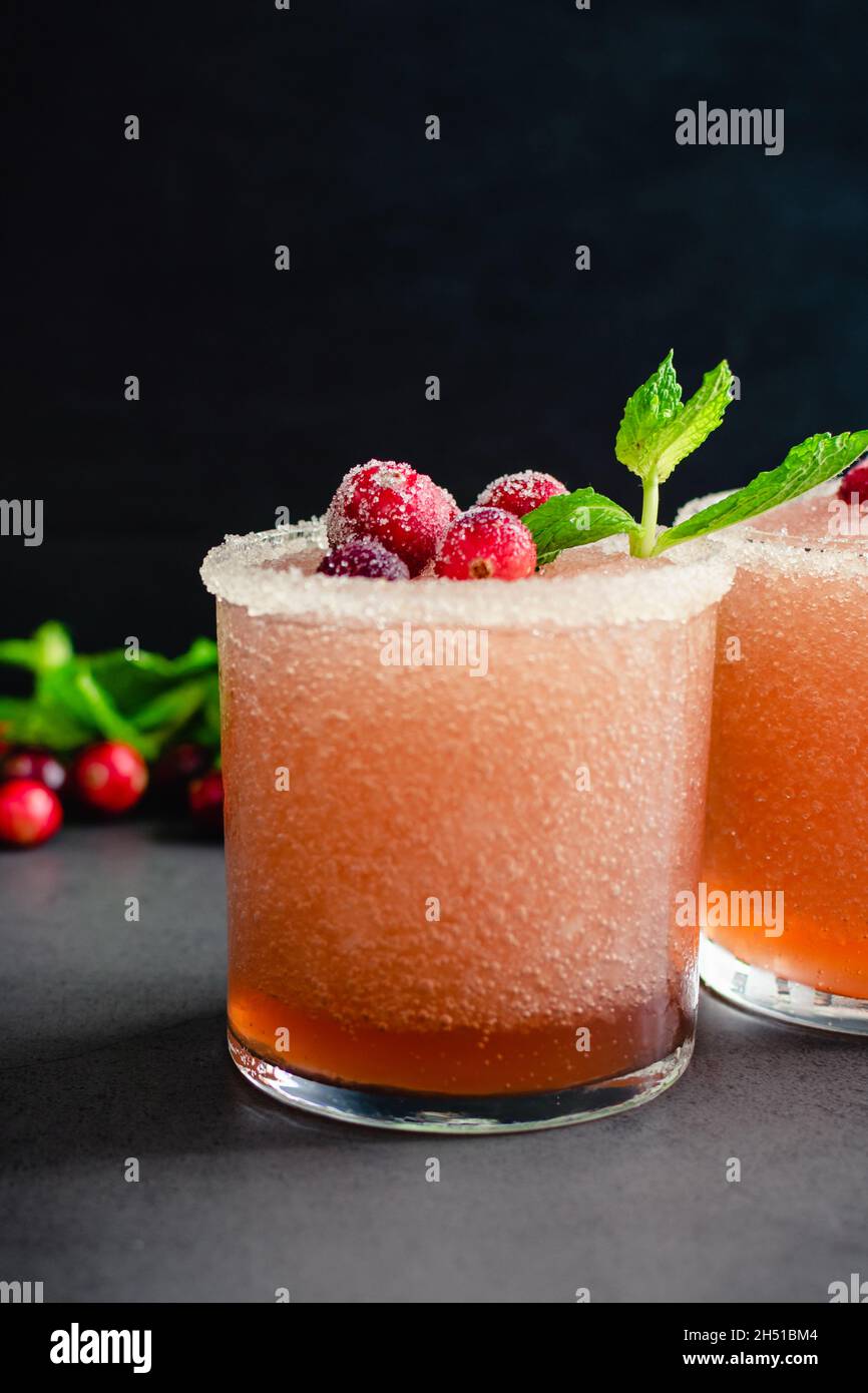 Cranberry Margaritas Garnished with Sugared Cranberries and Mint