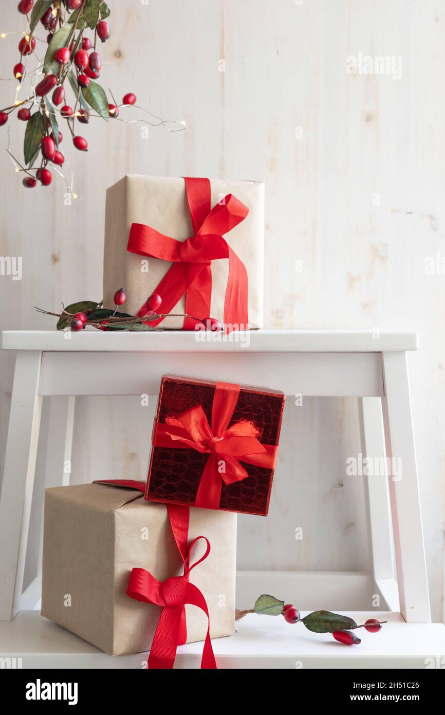 Pink, blue and white satin ribbon bows on wooden background