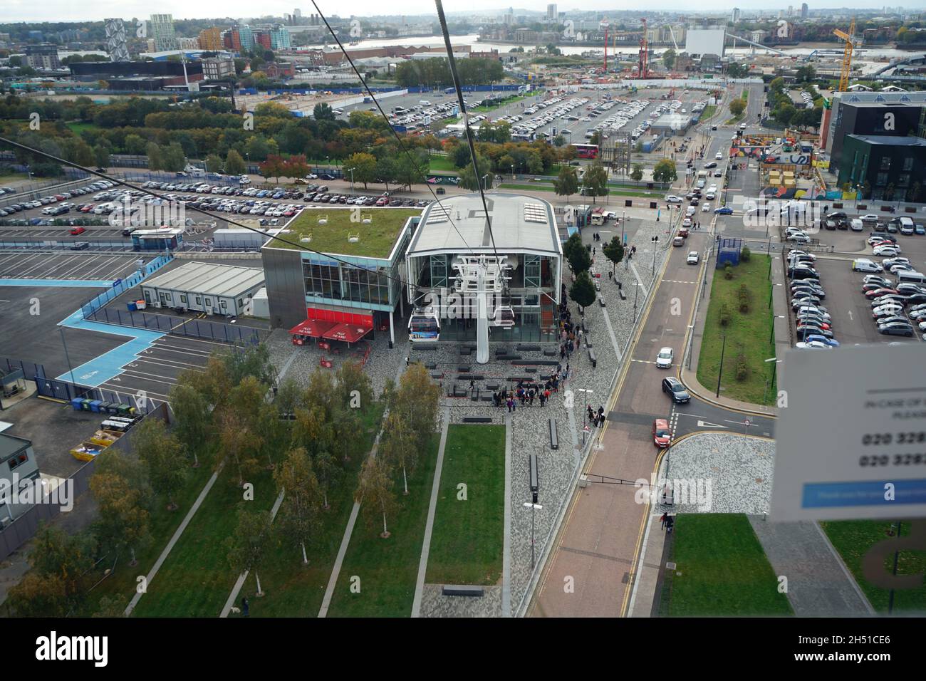 An aerial view of the Greenwich Peninsula from the emirates cable car zip lining over London River Thames in he U.K Stock Photo