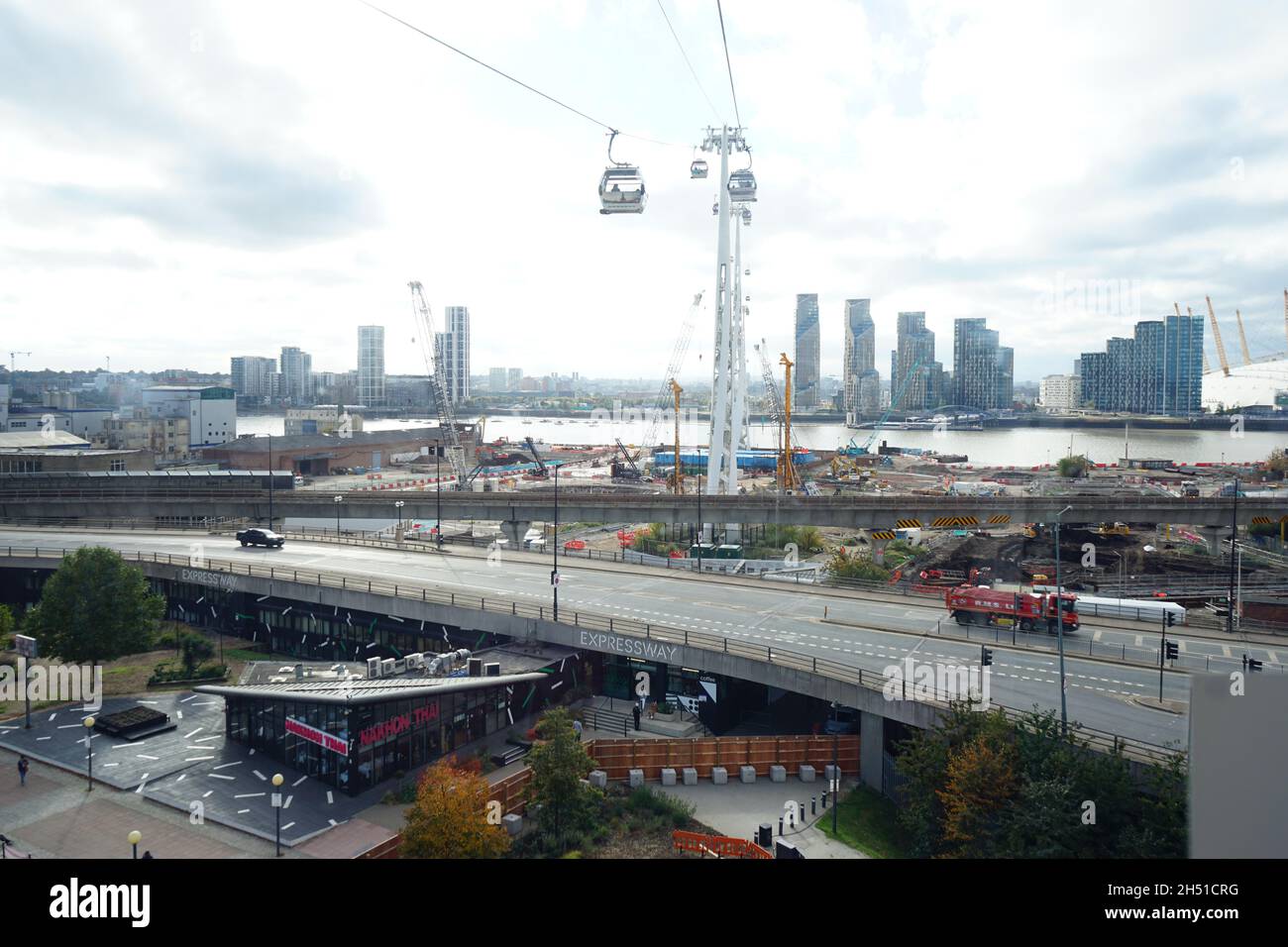 A view of the Royal Docks from the Emirates Cable car zip lining over the Thames from the Greenwich Peninsula to the Excel Centre at the Royal Docks Stock Photo