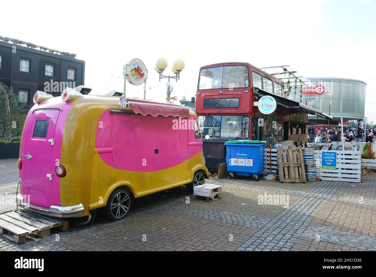 A view of a model van and a unused London double decker bus at the Excel  Centre at the Royal Docks in London, England, U.K Stock Photo - Alamy