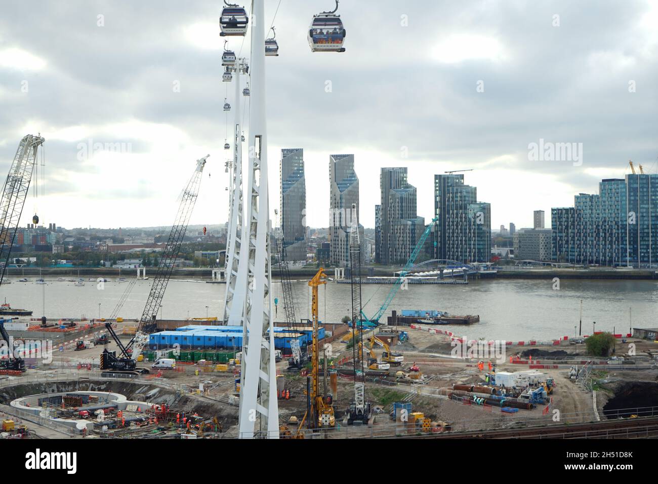 Emirates cable cars zip lining over London River Thames in he U.K Stock Photo