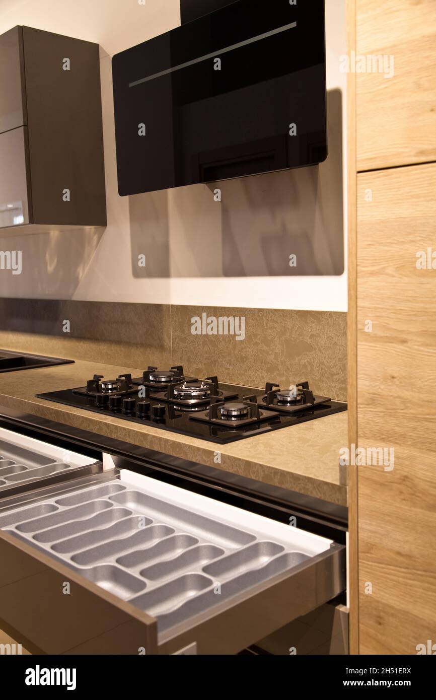 Interior of luxurious modern kitchen equipment and oak grey cabinets ...