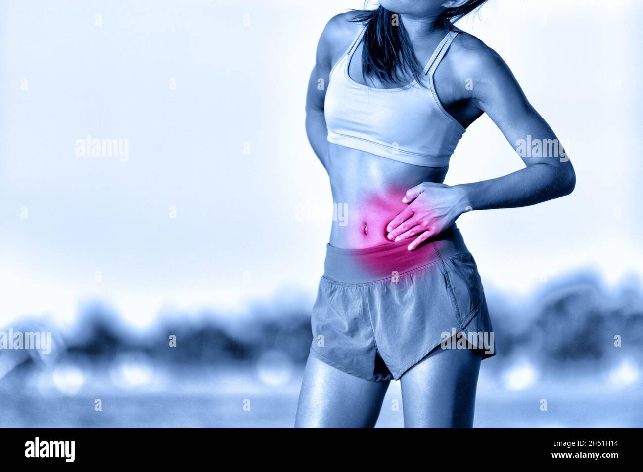 Stomach pain side stitch ache woman runner having cramp during workout