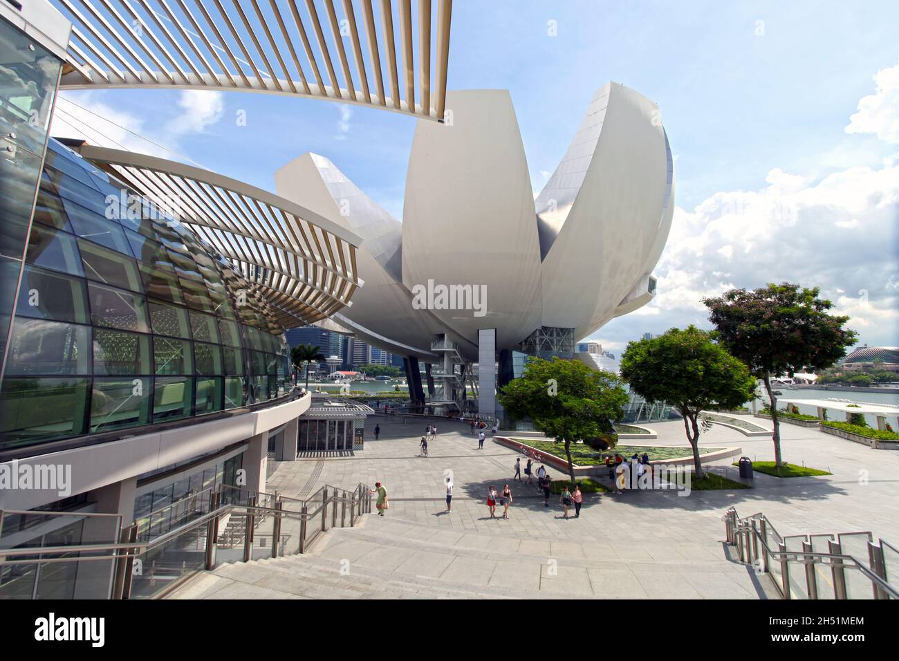 The ArtScience Museum at Marina Bay Sands with the shopping mall on the left in Singapore. Stock Photo