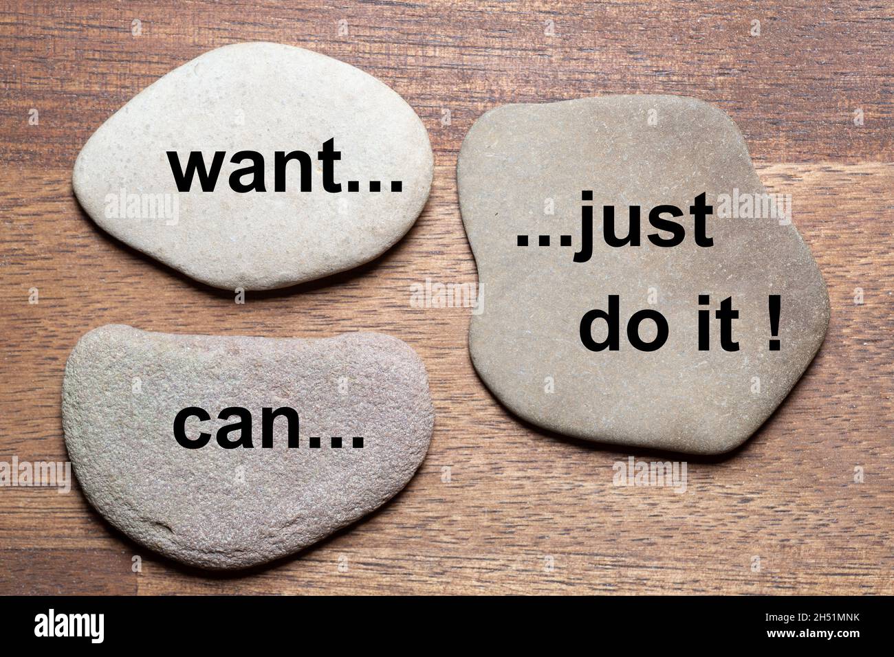 natural flat cut stones on a dark wooden table with the text: want ...