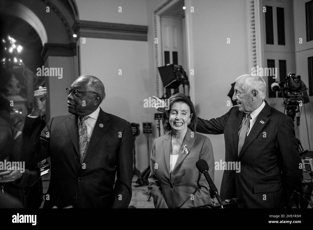 Speaker of the United States House of Representatives Nancy Pelosi (Democrat of California), center, is joined by United States House Majority Whip James Clyburn (Democrat of South Carolina), left, and United States House Majority Leader Steny Hoyer (Democrat of Maryland), right, to offer remarks to reporters as the House of Representatives prepares to vote on the Build Back Better and bipartisan Infrastructure bills at the US Capitol in Washington, DC, Thursday, November 4, 2021. Credit: Rod Lamkey/CNP Stock Photo