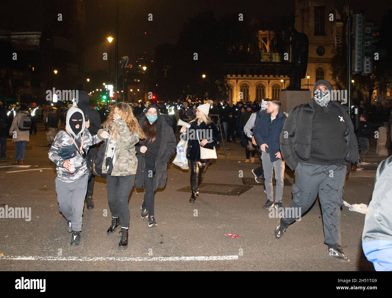 London, UK. 05th Nov, 2021. Riot police charge protesters at Parliament Square Credit: graham mitchell/Alamy Live News Stock Photo