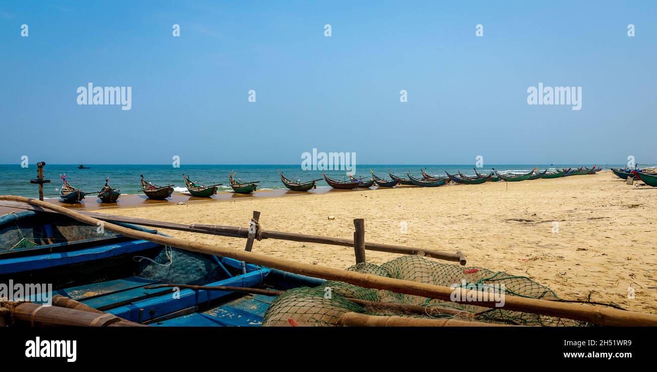 Fishing boats pulled up on the beach at Tam Ky, Tam Thanh. Stock Photo