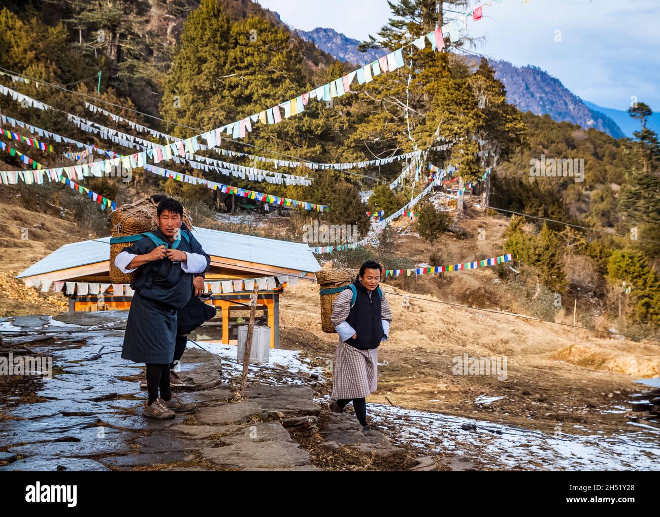 Thimphu/Bhutan - February 2016: Three Bhutanese men in traditional men