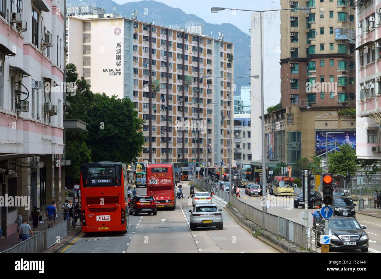 Ma Tau Wai Road with Geranium House of Ma Tau Wai Estate in the background (2021), Kowloon, Hong Kong Stock Photo
