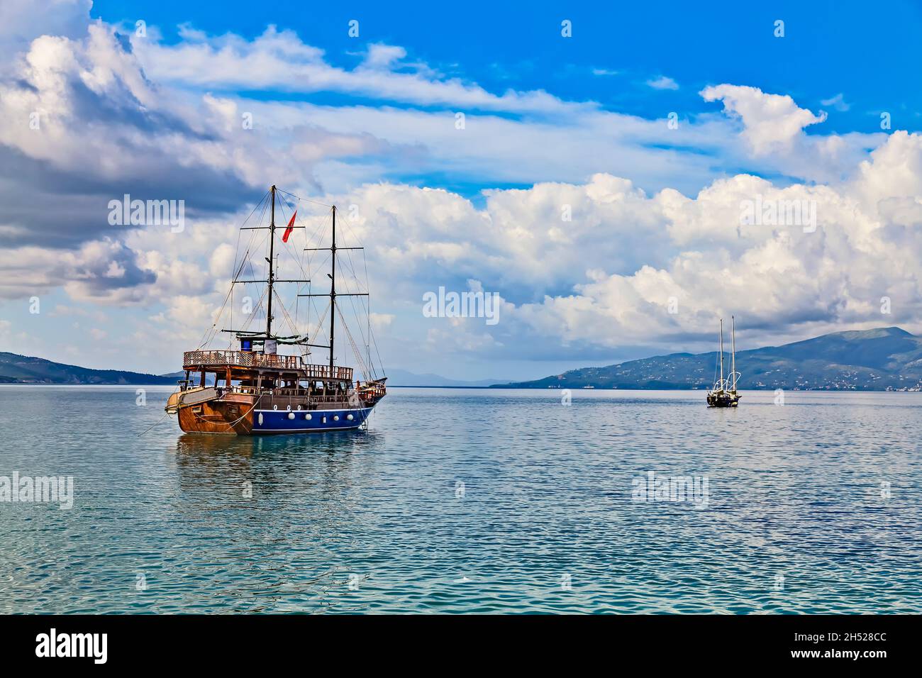 Vintage mast wooden sailing ship for sea tours in Saranda gulf, Albania