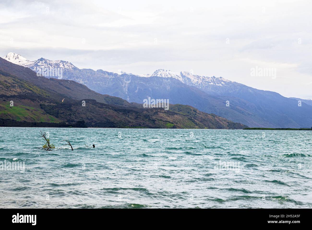 Wanaka lake. Cliffs and water. South Island, New Zealand Stock Photo ...