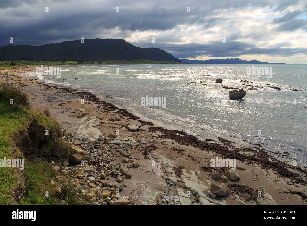 East Cape, the easternmost point in New Zealand. Storm clouds blow in over Hautai Beach Stock Photo