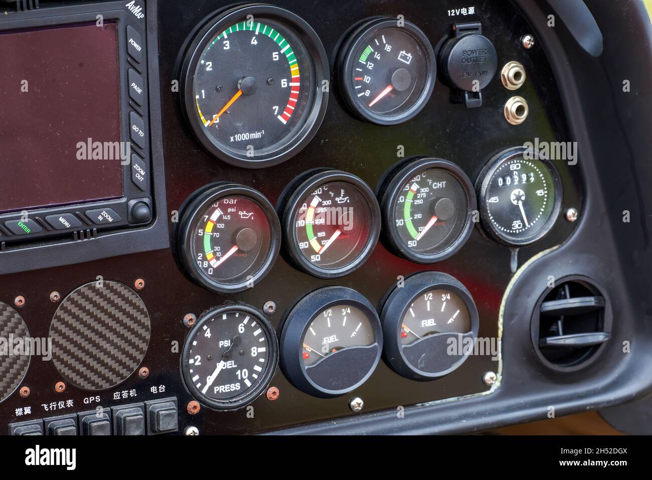 A closeup of the internal dashboard panel of a small aircraft Stock