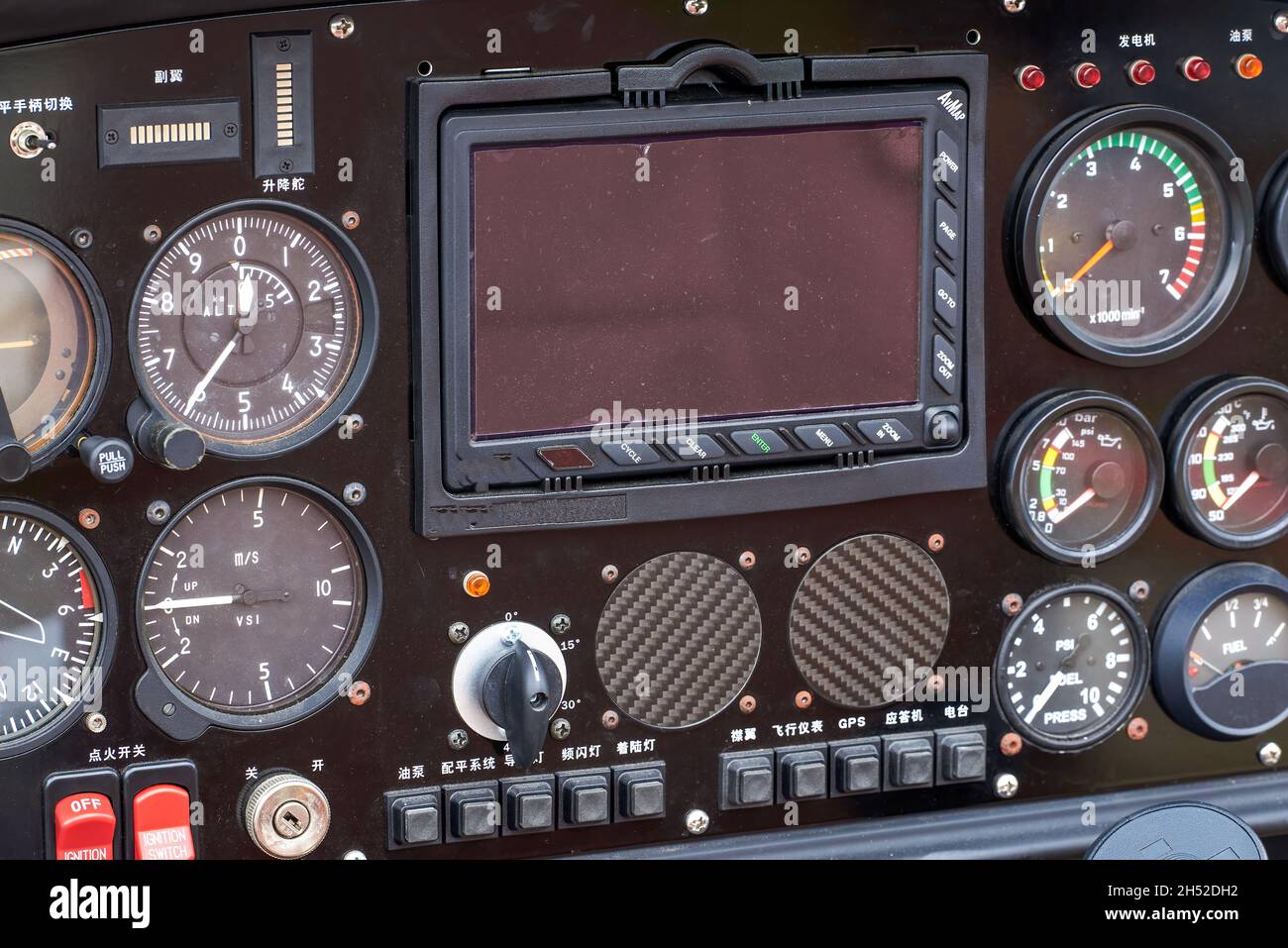 A closeup of the internal dashboard panel of a small aircraft Stock