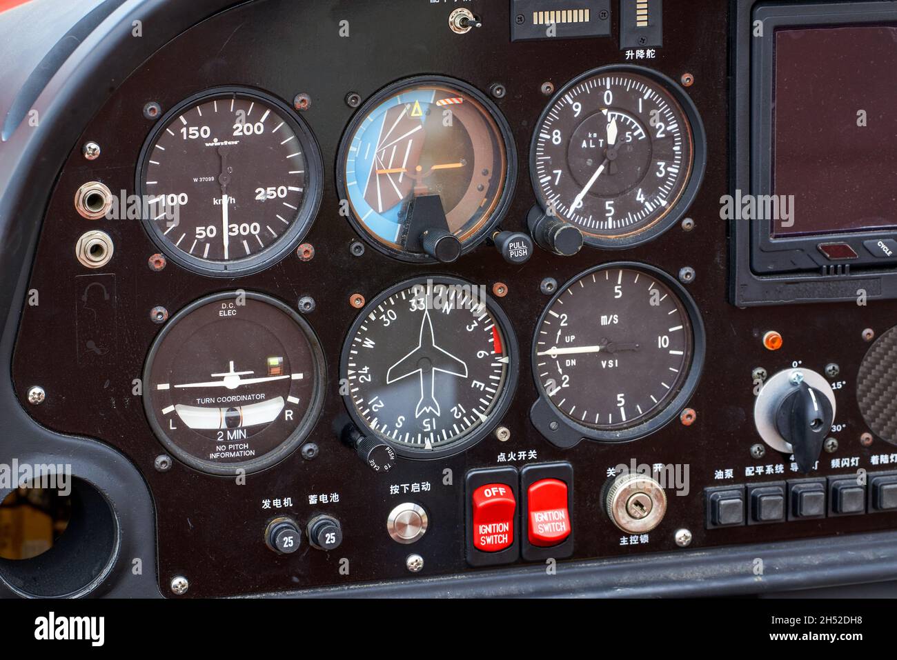 A closeup of the internal dashboard panel of a small aircraft Stock