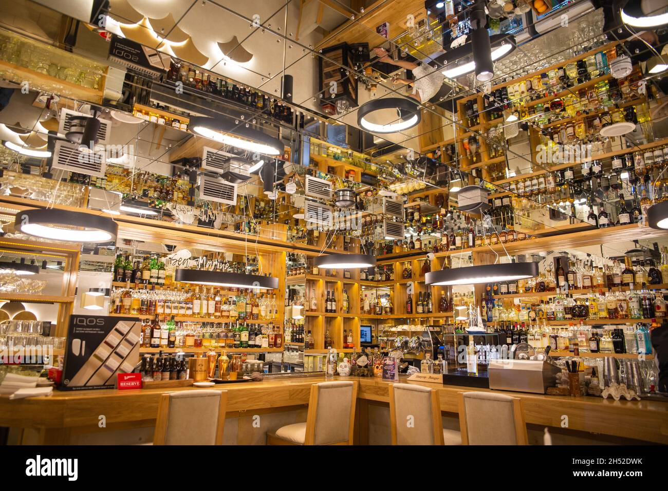 big bar with bottles. Bar with alcohol Stock Photo Alamy