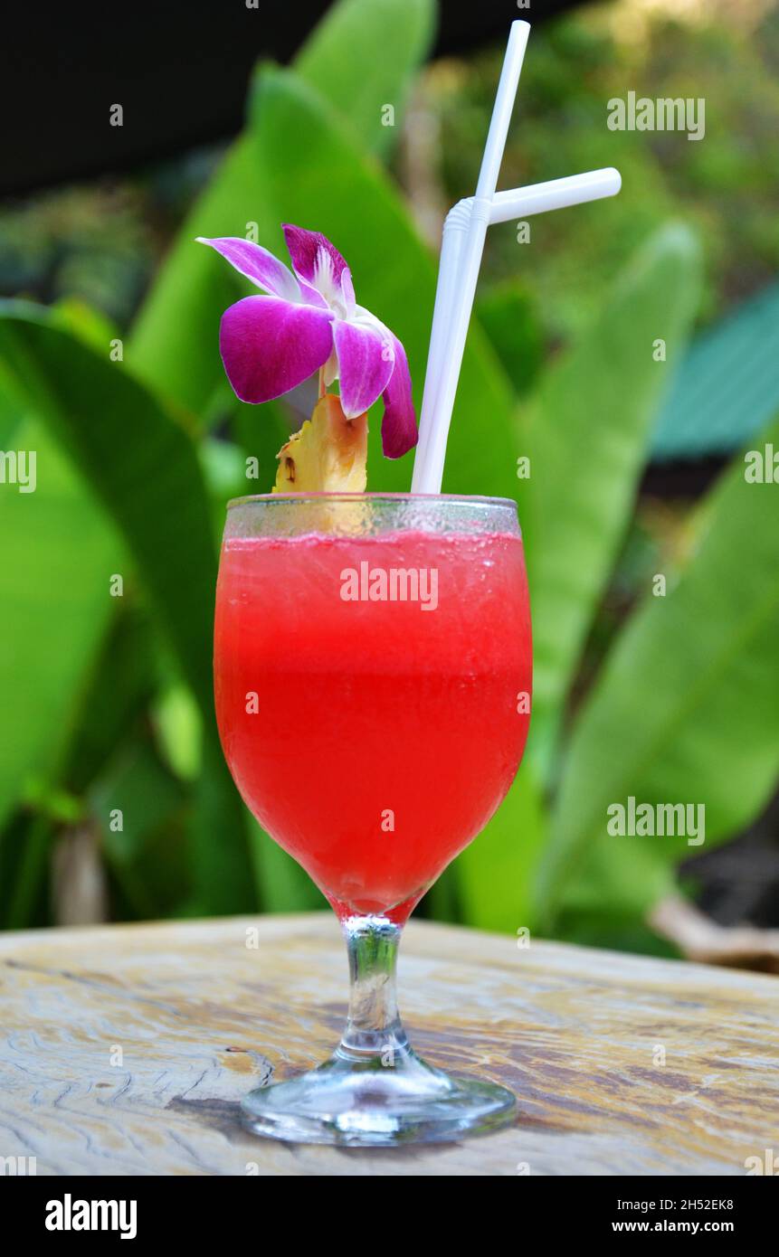 Cocktail strawberry punch in glass cup serve to customer guest travelers  eat drink at restaurant shop at resort hotel at Ao Nang Railay bay in Krabi  Stock Photo - Alamy