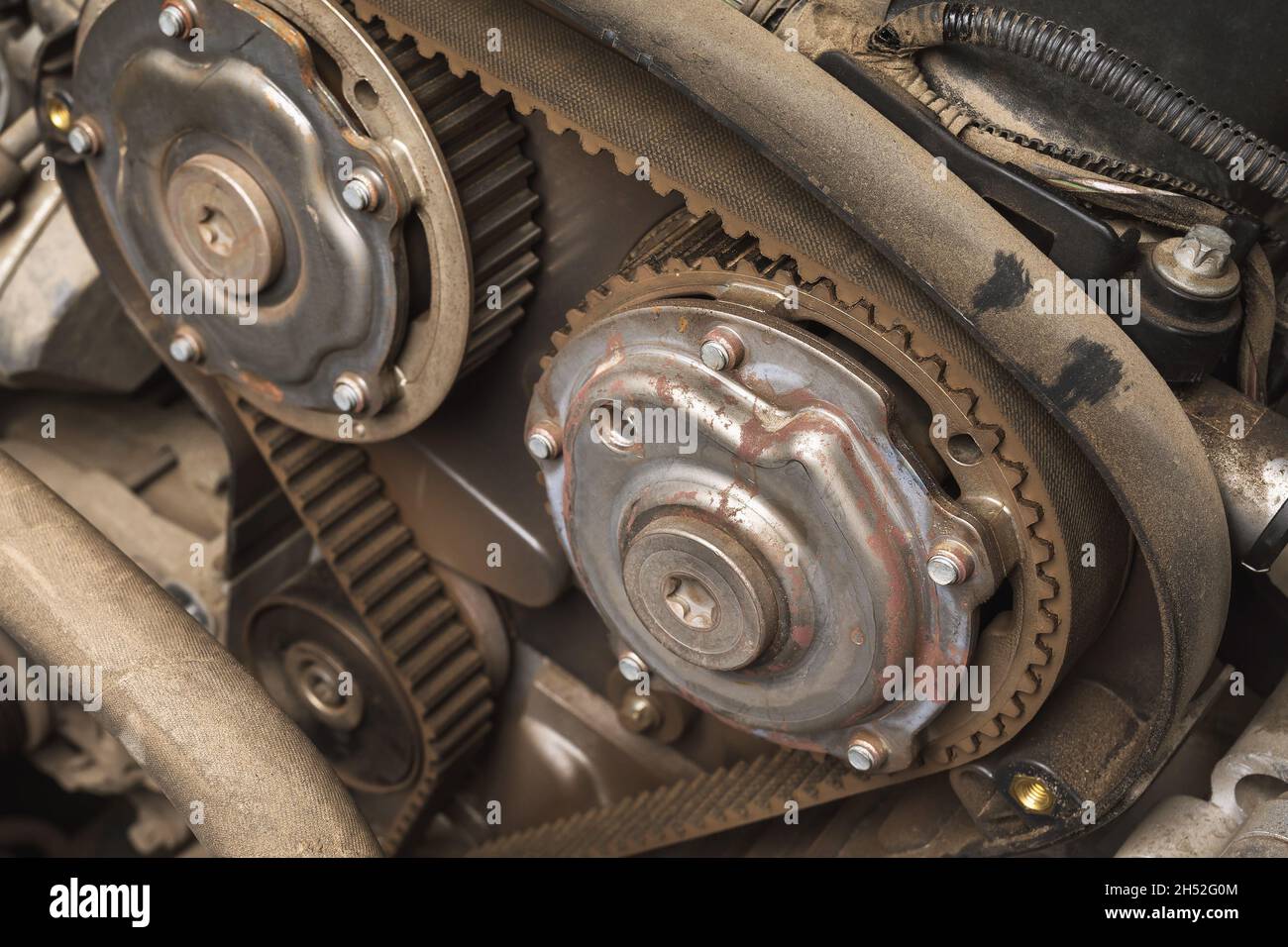 Old timing belt of a passenger car, closeup Stock Photo Alamy