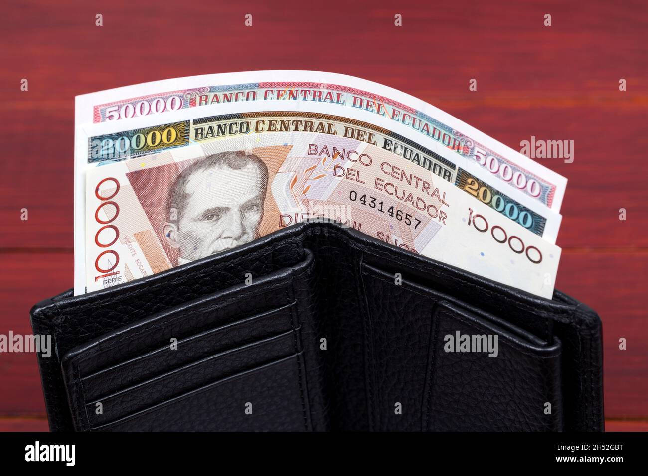 Ecuadorian money - sucre in the black wallet Stock Photo