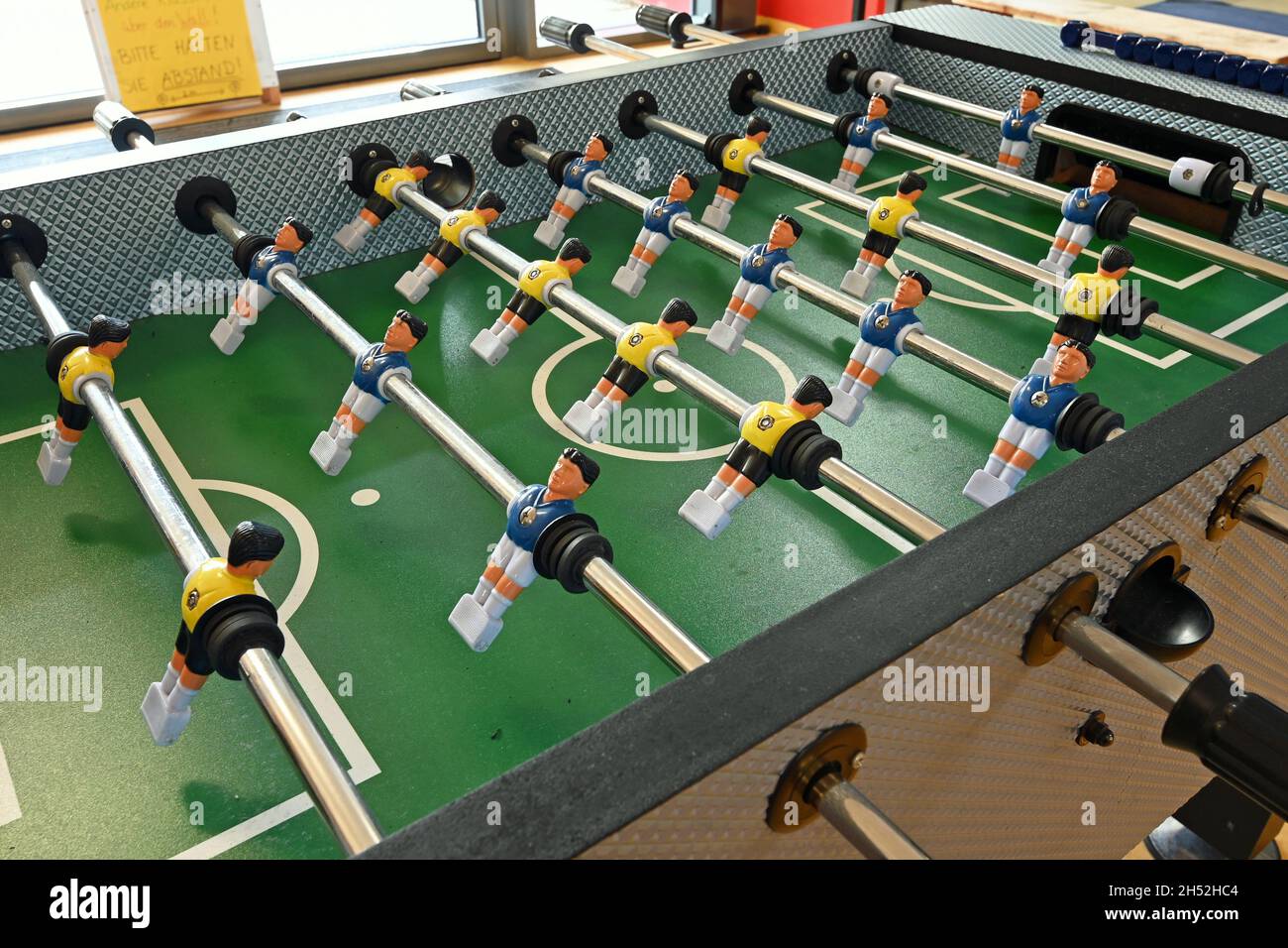 Foosball table during a break in play Stock Photo Alamy