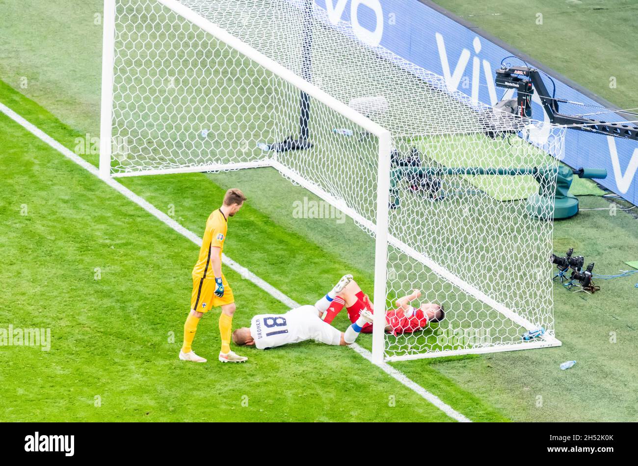 Saint Petersburg, Russia – June 16, 2021. Players Jere Uronen and Vyacheslav Karavayev tangled in the goalmouth  during EURO 2020 match Finland vs Rus Stock Photo
