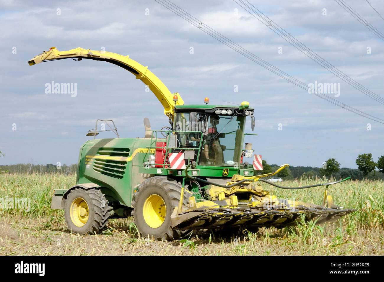 Combine harvester corn maize Agricultural machinery Stock Photo
