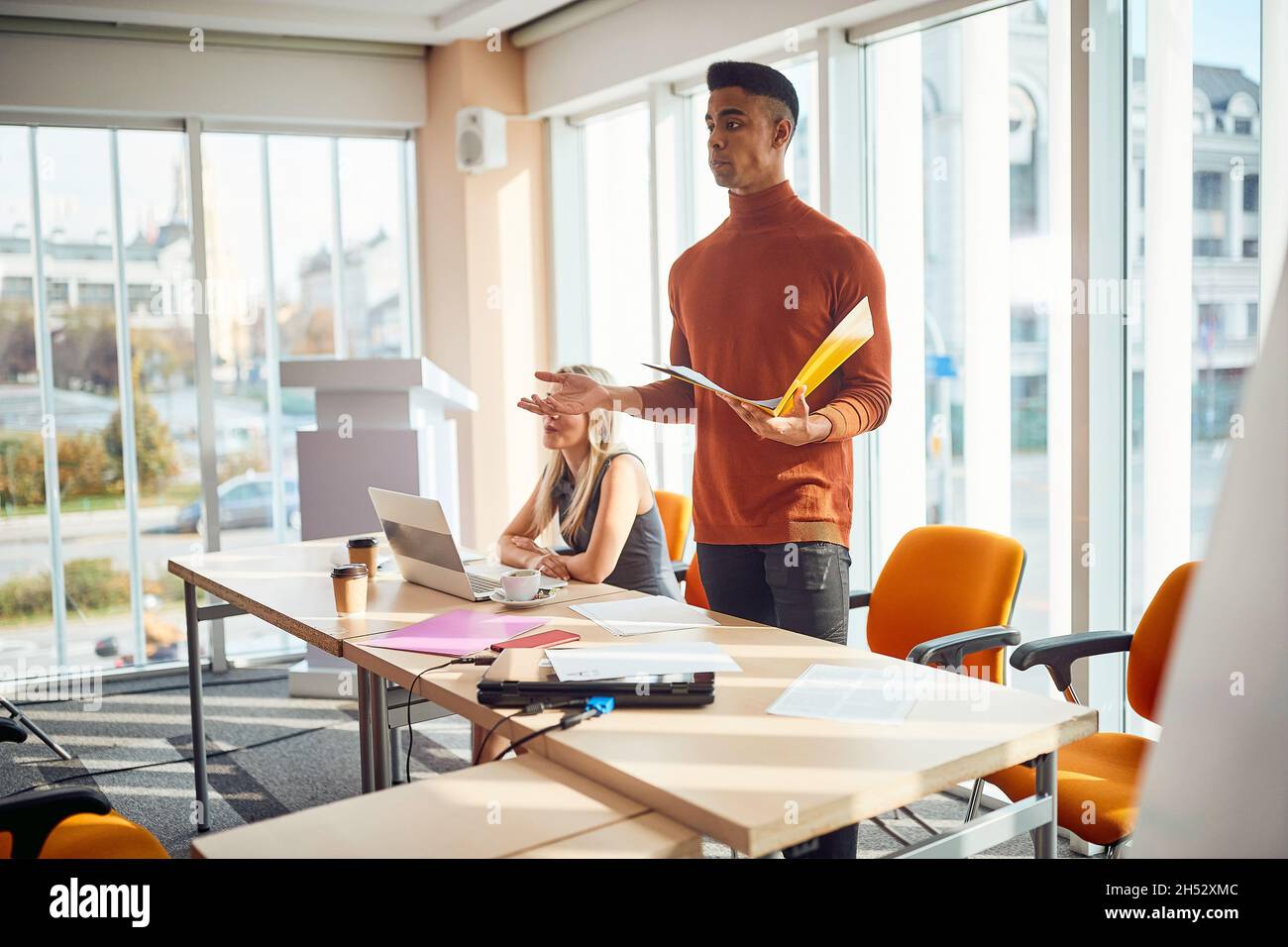 young afro-american man leading a meeting at  company. Stock Photo