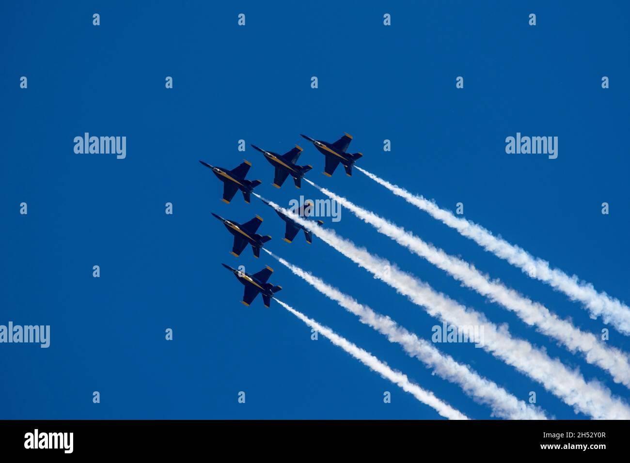 Group of flying aircrafts against a blue sky during an airshow Stock ...