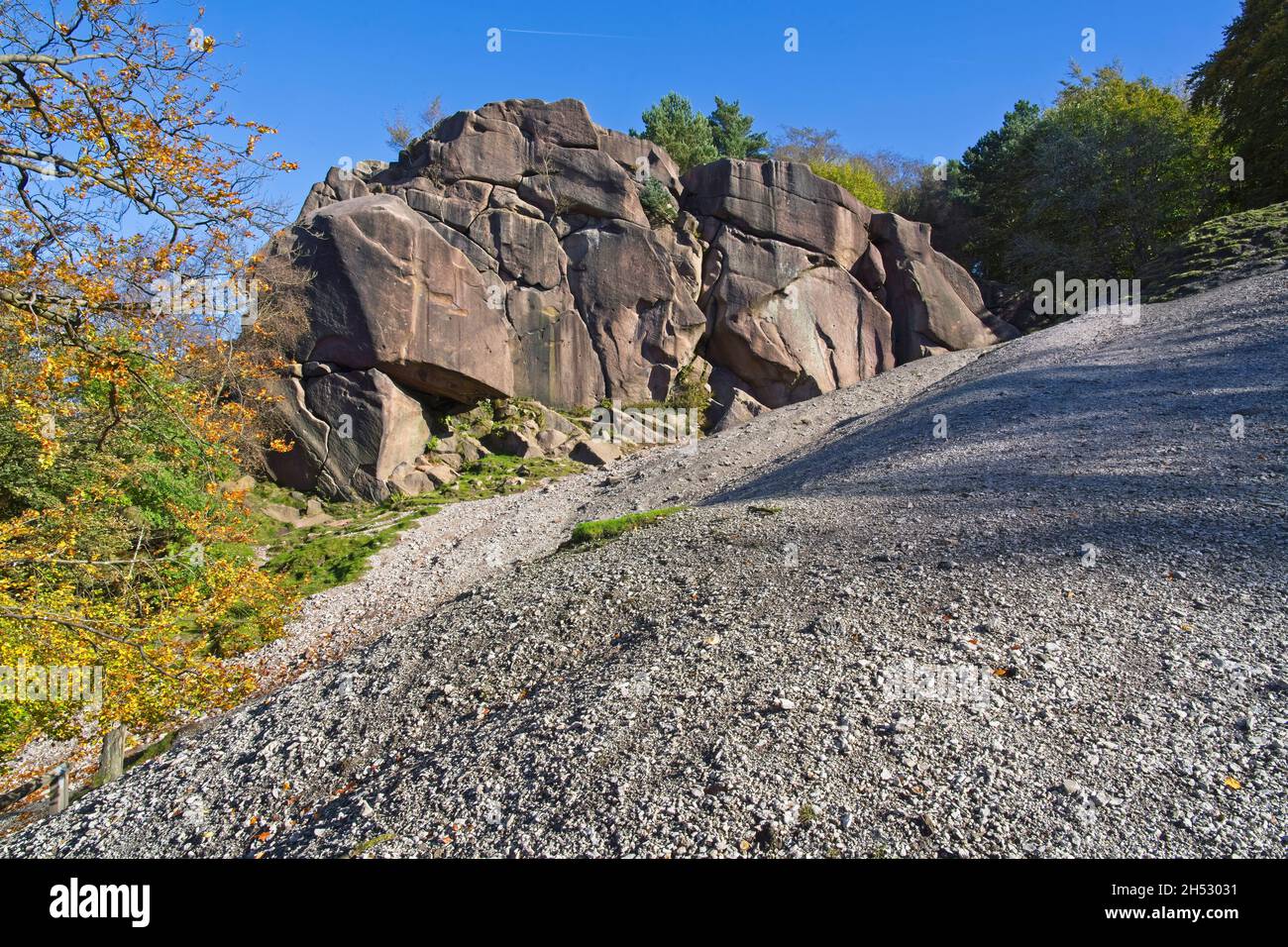 The Black Rocks gritstone outcrop on a steep slope near Wirksworth, Derbyshire on a bright autumn morning. Stock Photo