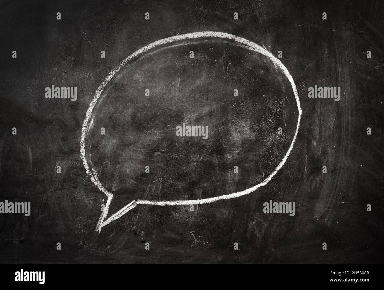 Comics speech bubble drawn on the black chalkboard Stock Photo Alamy