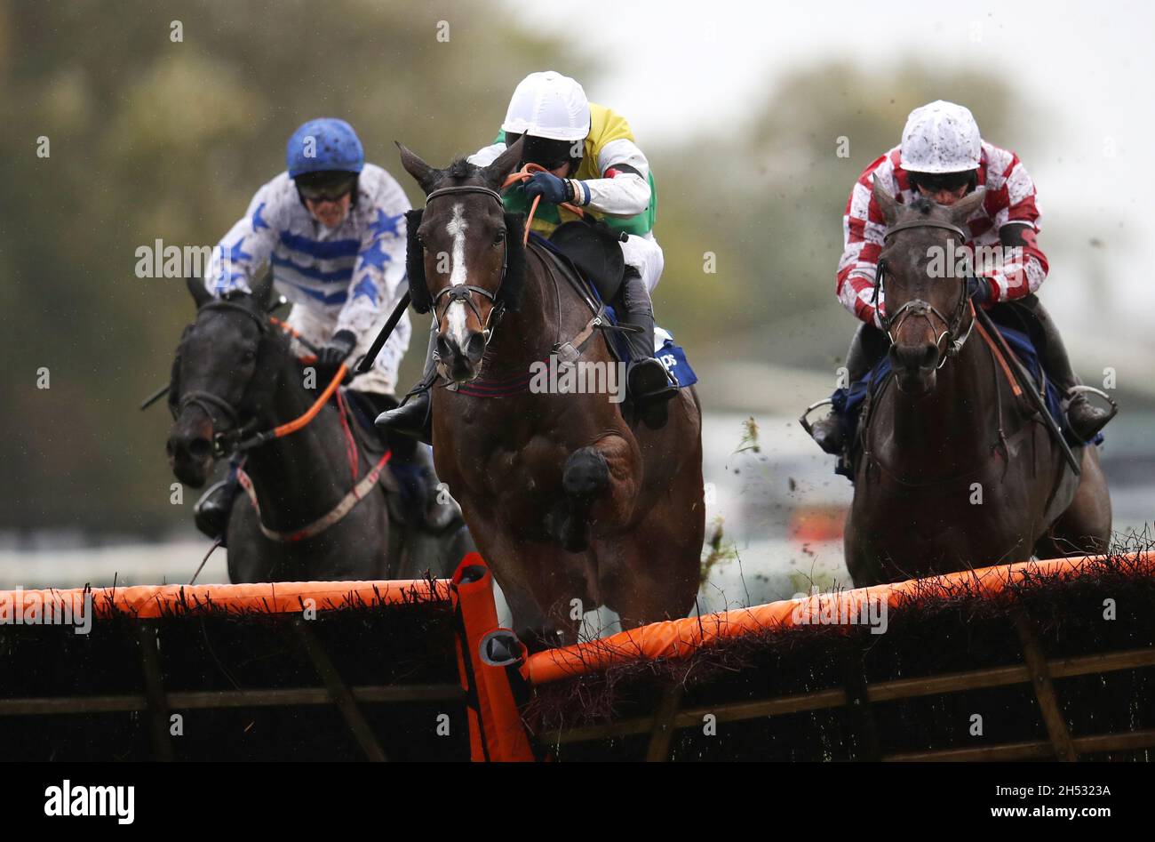 Deise Aba ridden by James Best leads over a fence before Koshari ridden by Jonathan Moore (left) goes on to win the Pertemps Network Handicap Hurdle during the Betway Autumn Raceday at Aintree racecourse, Liverpool. Picture date: Saturday November 6, 2021. Stock Photo