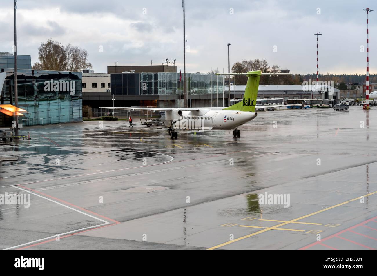 Riga, Latvia - October 28, 2018:  AirBaltic Aircraft preparation for departure in the Riga International Airport. Stock Photo
